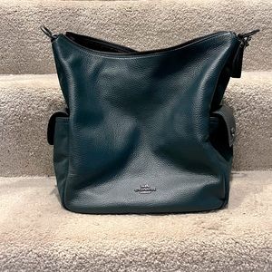 Coach purse. Lightly used, only used a few times. No damages or scratches.